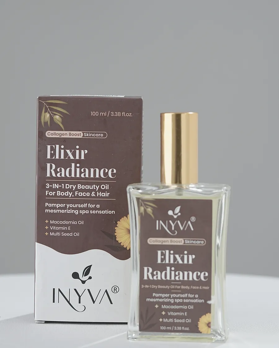 INYVA Elixir Radiance dry beauty oil beside its carton